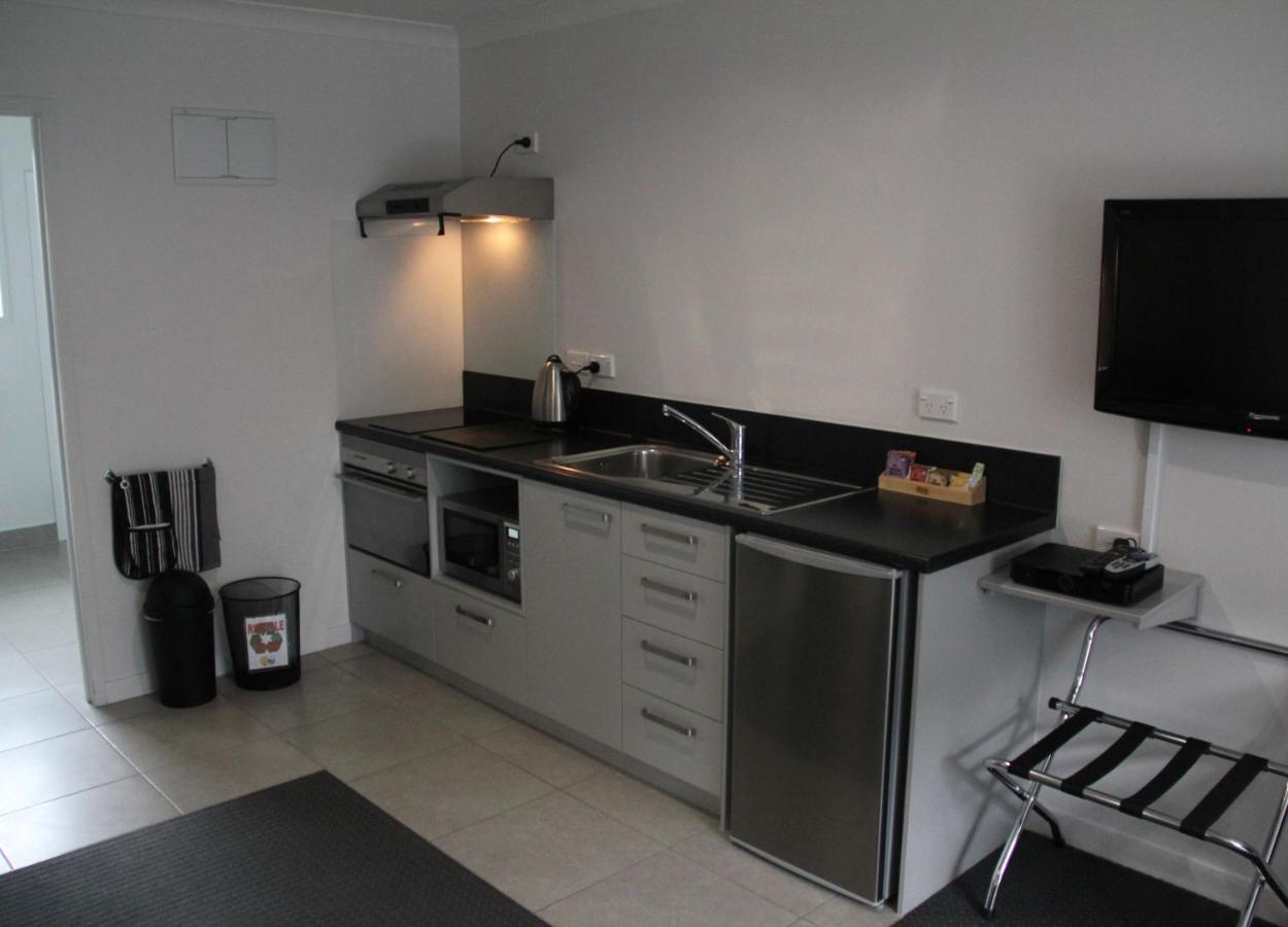 プケクラ モーター ロッジ ニュープリマス エクステリア 写真 A kitchenette in a hotel